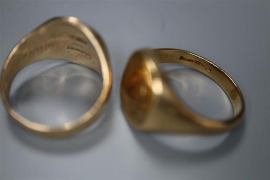 Three assorted 9ct gold rings including a wedding band, gross 24.1 grams.